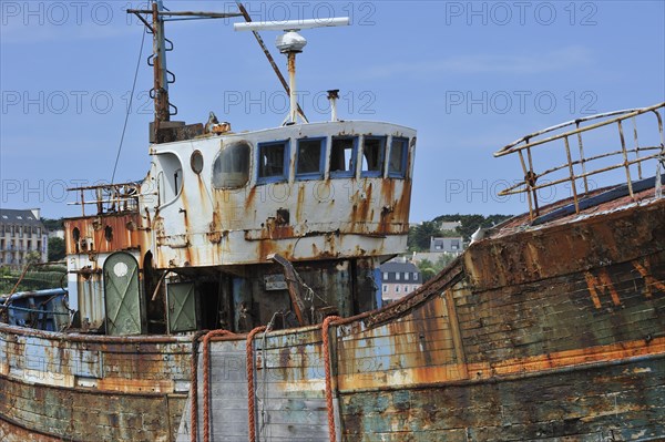 Wreck of small trawler fishing boat in the harbour of Camaret-sur-Mer