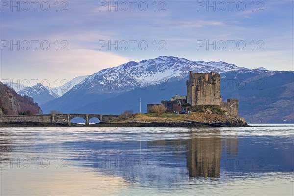 Eilean Donan Castle in Loch Duich in winter at sunset