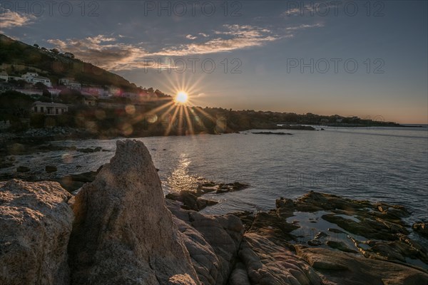 The sun sets in the Mediterranean. Photographed in the west of the Mediterranean island of Corsica