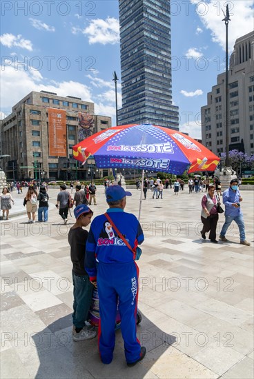 Man and boy selling ice creams near Bellas Artes