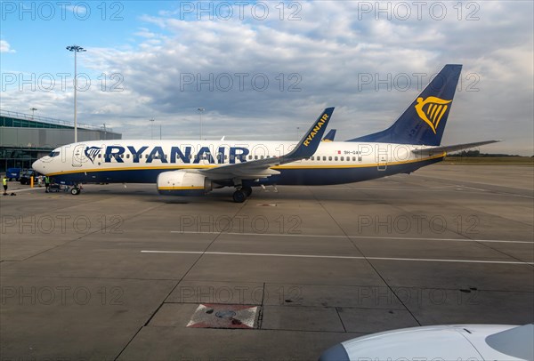 View through plane window Ryanair Boeing 737-8AS plane 9H-QAV London Stansted Airport