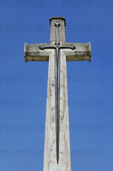 Cross of Sacrifice at military cemetery of the Commonwealth War Graves Commission burial ground for First World War One British soldiers in West Flanders