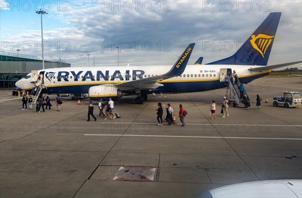 View through plane window Ryanair Boeing 737-8AS plane 9H-QAV London Stansted Airport