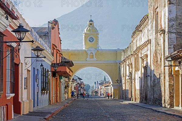 Colourful colonial houses and the 17th century Arco de Santa Catalina Arch in the city Antigua Guatemala