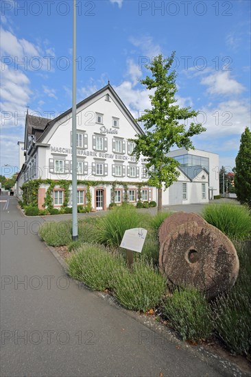 Historic building of the Gustav Eirich company with millstones