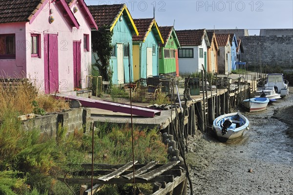Colourful cabins of oyster farmers in the harbour at Le Chateau-d'Oleron on the island Ile d'Oleron