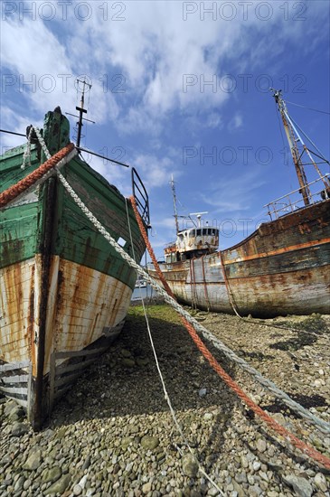 Wrecks of small trawler fishing boats in the harbour of Camaret-sur-Mer