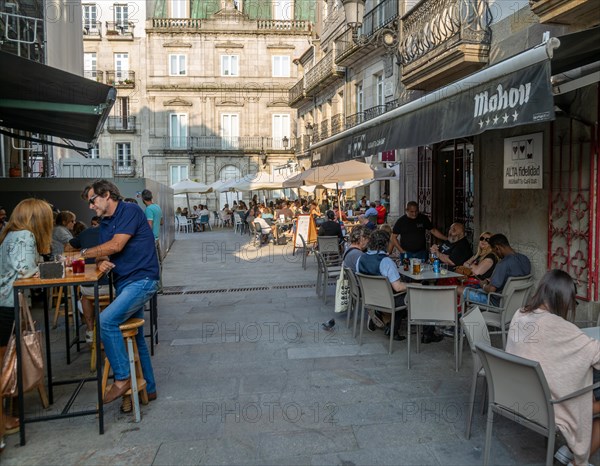 People and street cafes bars