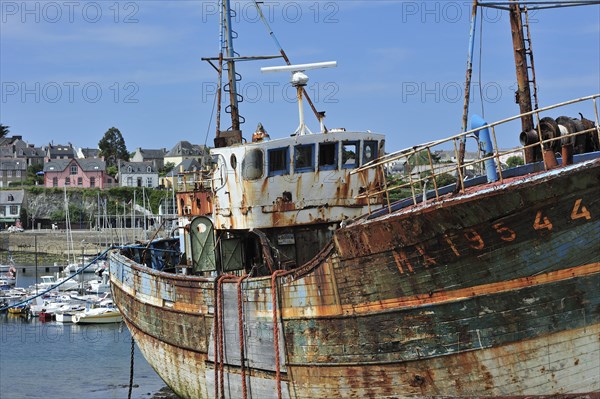 Wreck of small trawler fishing boat in the harbour of Camaret-sur-Mer