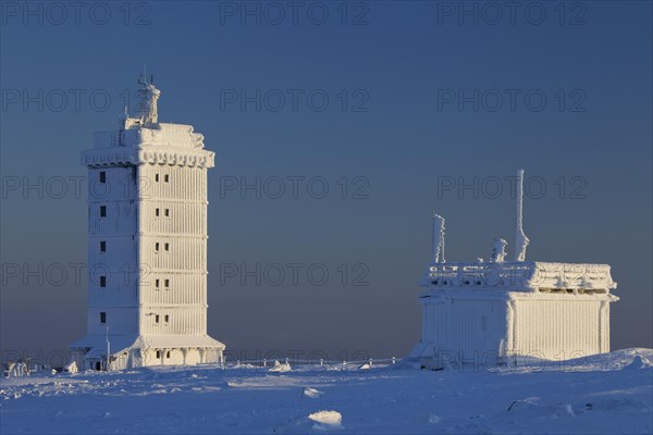 The Brocken weather station on the Brocken in the snow in winter