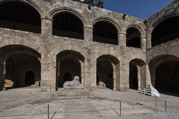 Two-storey building with a large courtyard and surrounding arcade