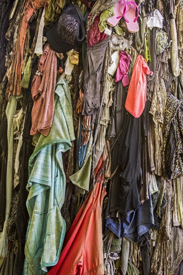 Old clothes hanging from the Chene a clous