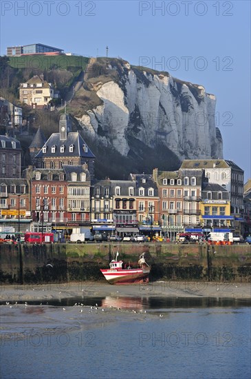 Fishing boat at low tide in the harbour at Le Treport