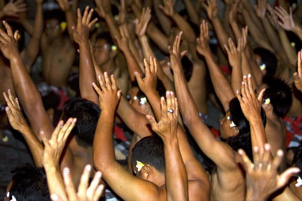 Waving hands during Kecak dance performance