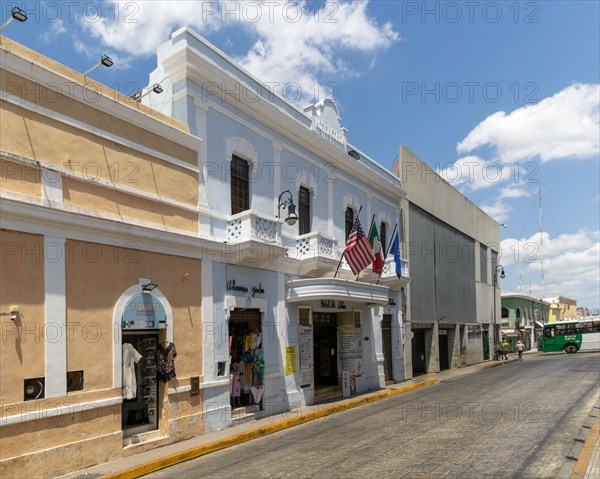 Flags flying on frontage of Hotel Colon