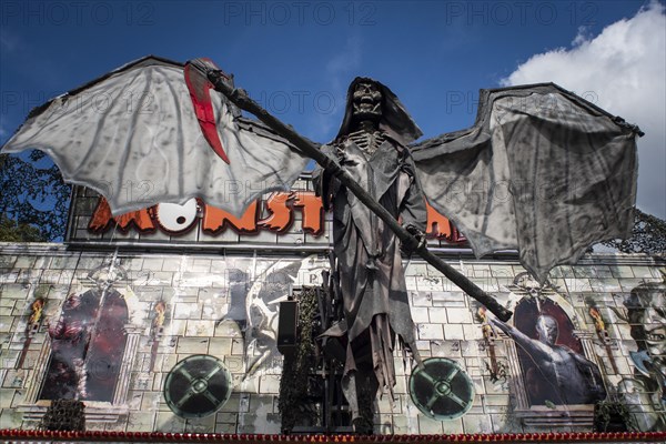 Figure of a winged grim reaper on the facade of a ghost train