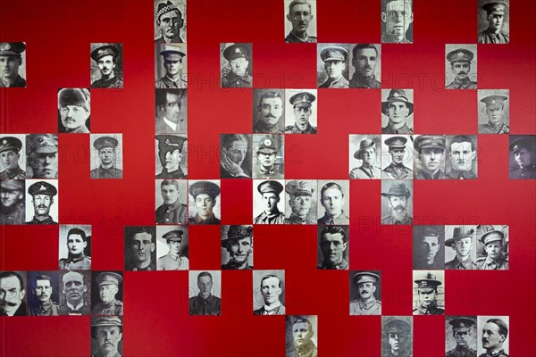 Photo wall showing perished soldiers in visitor centre of the Lijssenthoek Military Cemetery