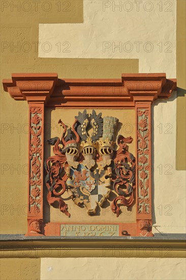 Coat of arms of Margraves of Brandenburg-Ansbach with floral decorations and the year 1567