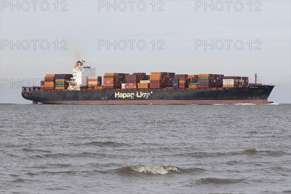 The container ship Missouri Express of Hapag-Lloyd shipping line entering the Elbe River in Cuxhaven