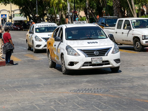 Taximeter metered taxi cars in city centre