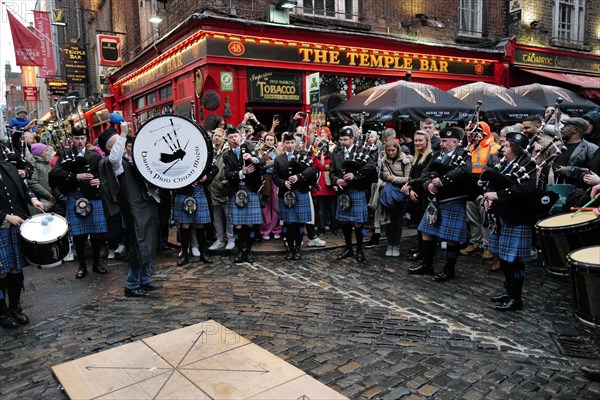 Members of the Clew Bay pipe band perform in Temple Bar during Tradfest