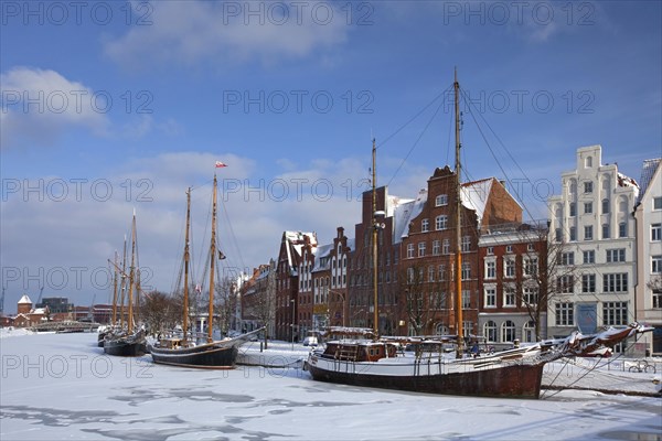 Sailing ship in the snow in winter in the harbour museum at the Hanseatic City of Luebeck