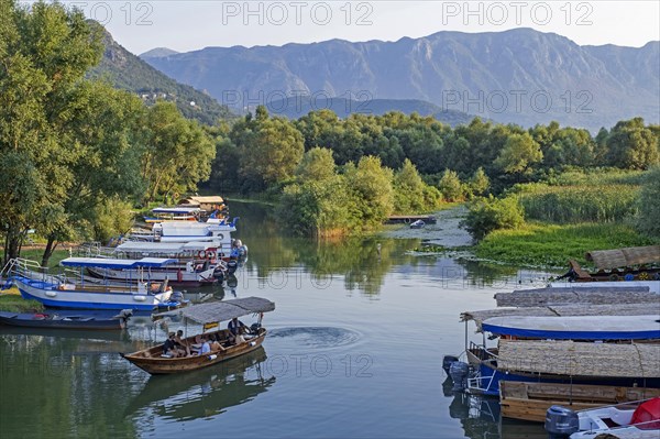 Tourist boats at Virpazar on the Crmnica river which flows into Skadar Lake