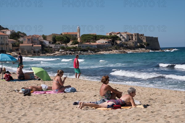 Beach with a view of a Corsican holiday village. Taken in Corsica