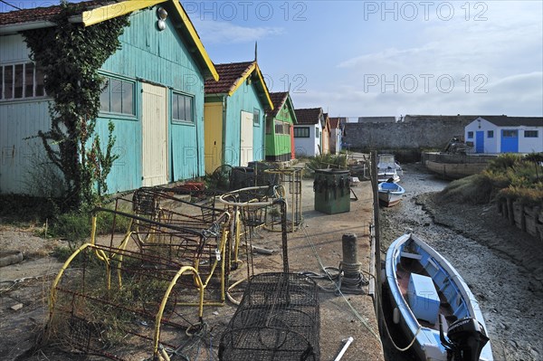 Colourful cabins of oyster farmers in the harbour at Le Chateau-d'Oleron on the island Ile d'Oleron