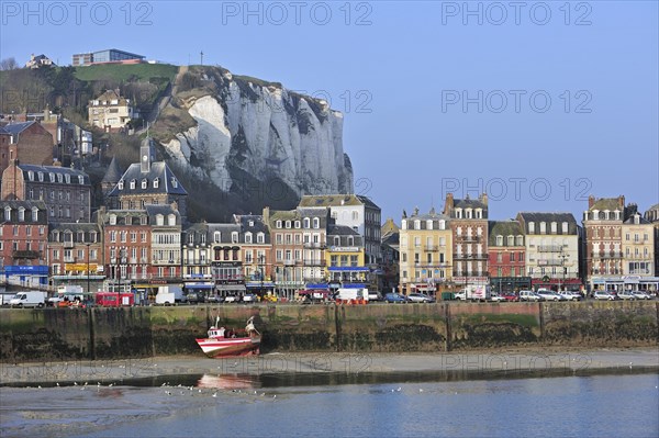 Fishing boat at low tide in the harbour at Le Treport