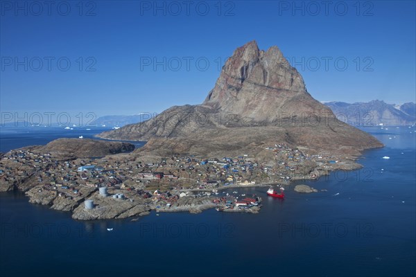 Uummannaq village with colourful houses in front of Heart Mountain