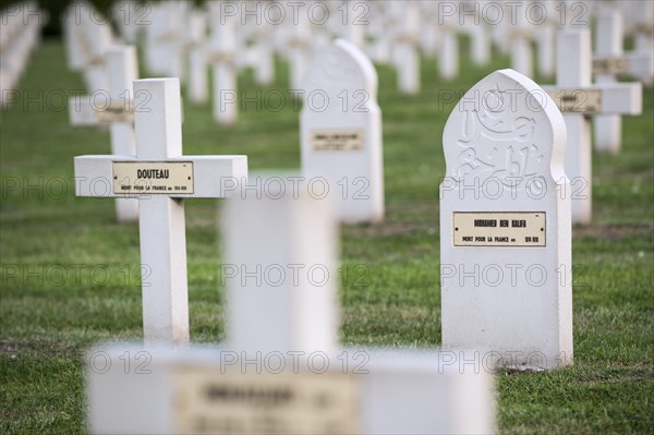 Muslim stele among French graves on the First World War One cemetery Cimetiere National Francais de Saint-Charles de Potyze near Ypres