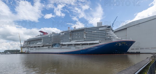 New building of the Carnival Jubilee in the shipyard harbour of Meyer Werft