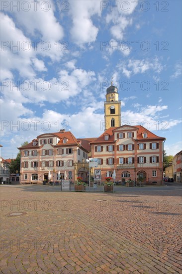 Twin houses and tower of St. John's Minster Church