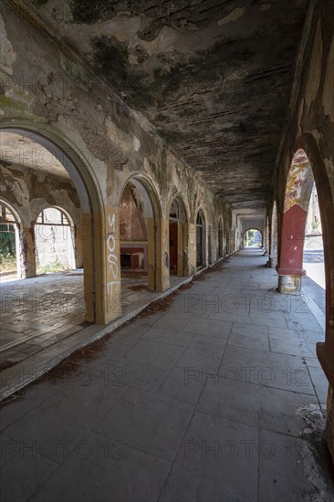 Dilapidated arcade building