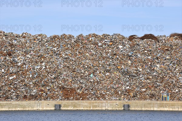 Scrap heap along the Ghent-Terneuzen Canal at Ghent seaport