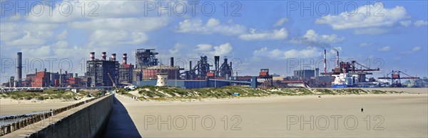 View over heavy industry seen from the beach at Dunkirk