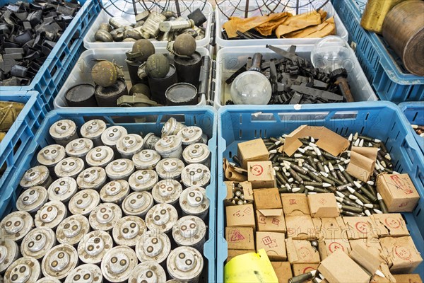 Stand at militaria fair selling World War Two memorabilia like bomb fuzes