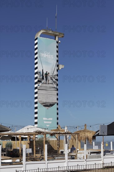 Beach bar with bast umbrellas