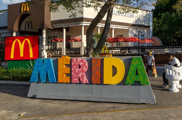 Large letters spell city name outside McDonalds