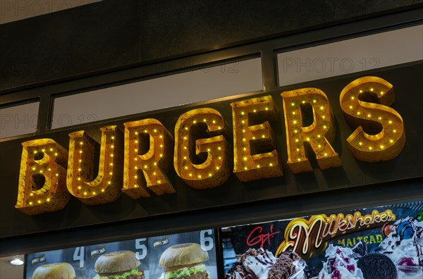 Burgers sign at Flavortown cafe restaurant bar