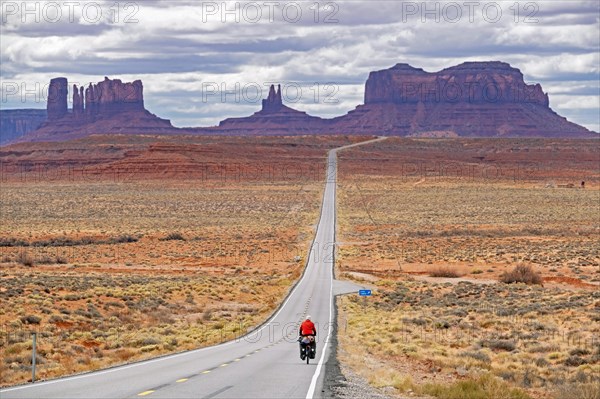 Forrest Gump Point and lonely cyclist on Highway 163 Scenic Drive