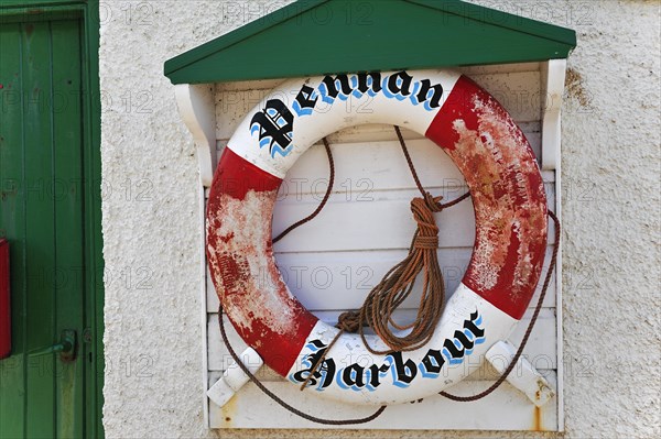 Life buoy in the harbour of the small coastal village Pennan in Aberdeenshire