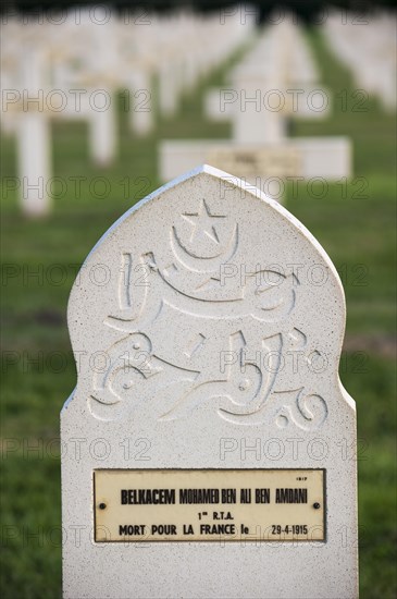 Muslim stele among French graves on the First World War One cemetery Cimetiere National Francais de Saint-Charles de Potyze near Ypres