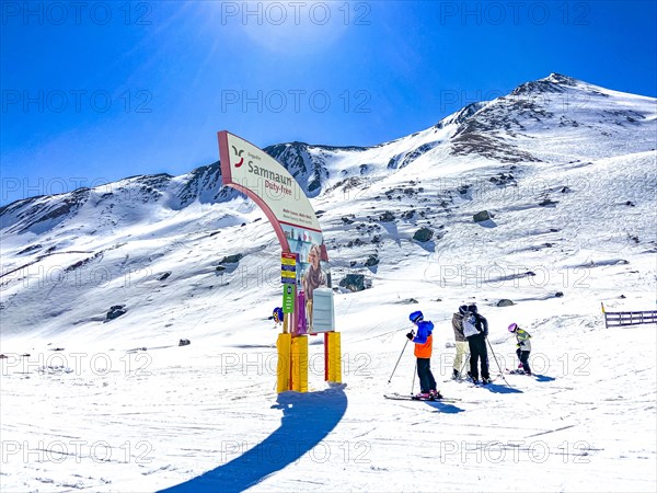 Duty fee advertising on Alp Trida on the ski slope between Ischgl and Samnaun