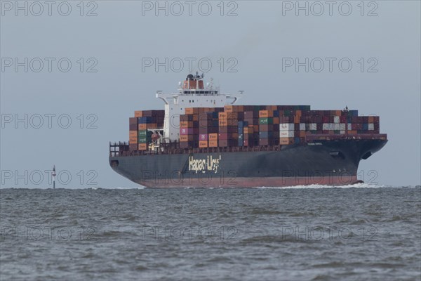 The container ship Missouri Express of Hapag-Lloyd shipping line entering the Elbe River in Cuxhaven