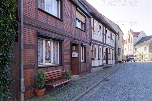 Half-timbered houses in the cobbled Lange Strasse in the Hanseatic town of Werben in the Altmark region. Werben