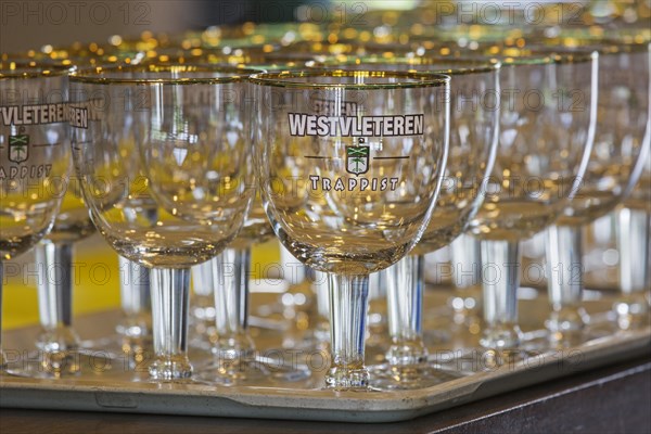 Tray with empty Trappist Westvleteren beer glasses in cafe