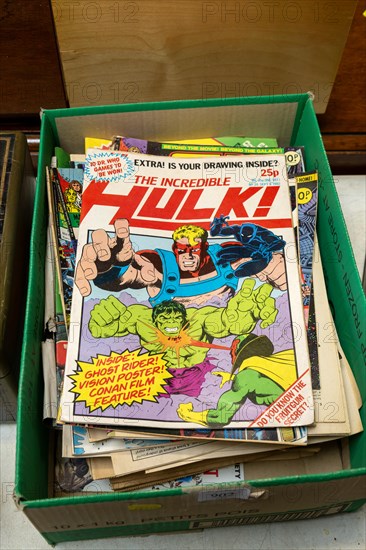 Box of The Incredible Hulk comics on display in auction room