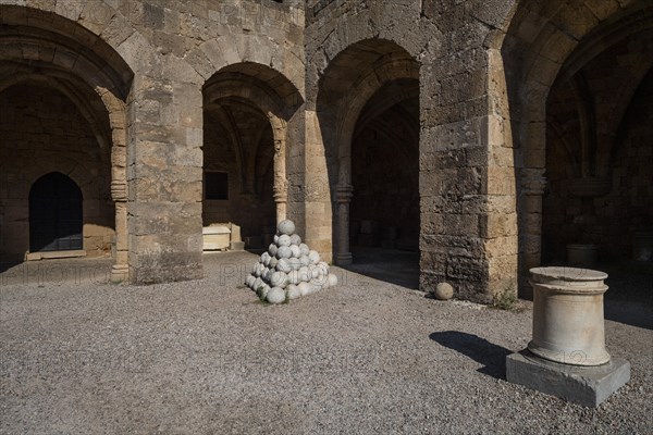 Two-storey building with a large courtyard and surrounding arcade